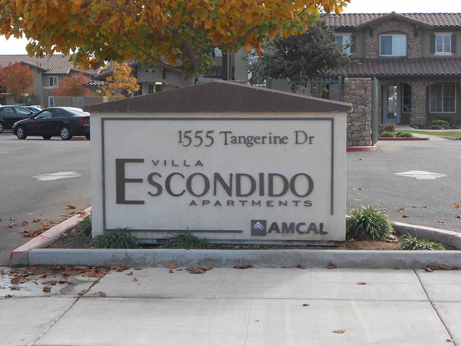 Monument sign l Villa Escondido Apartments in Orange Cove CA